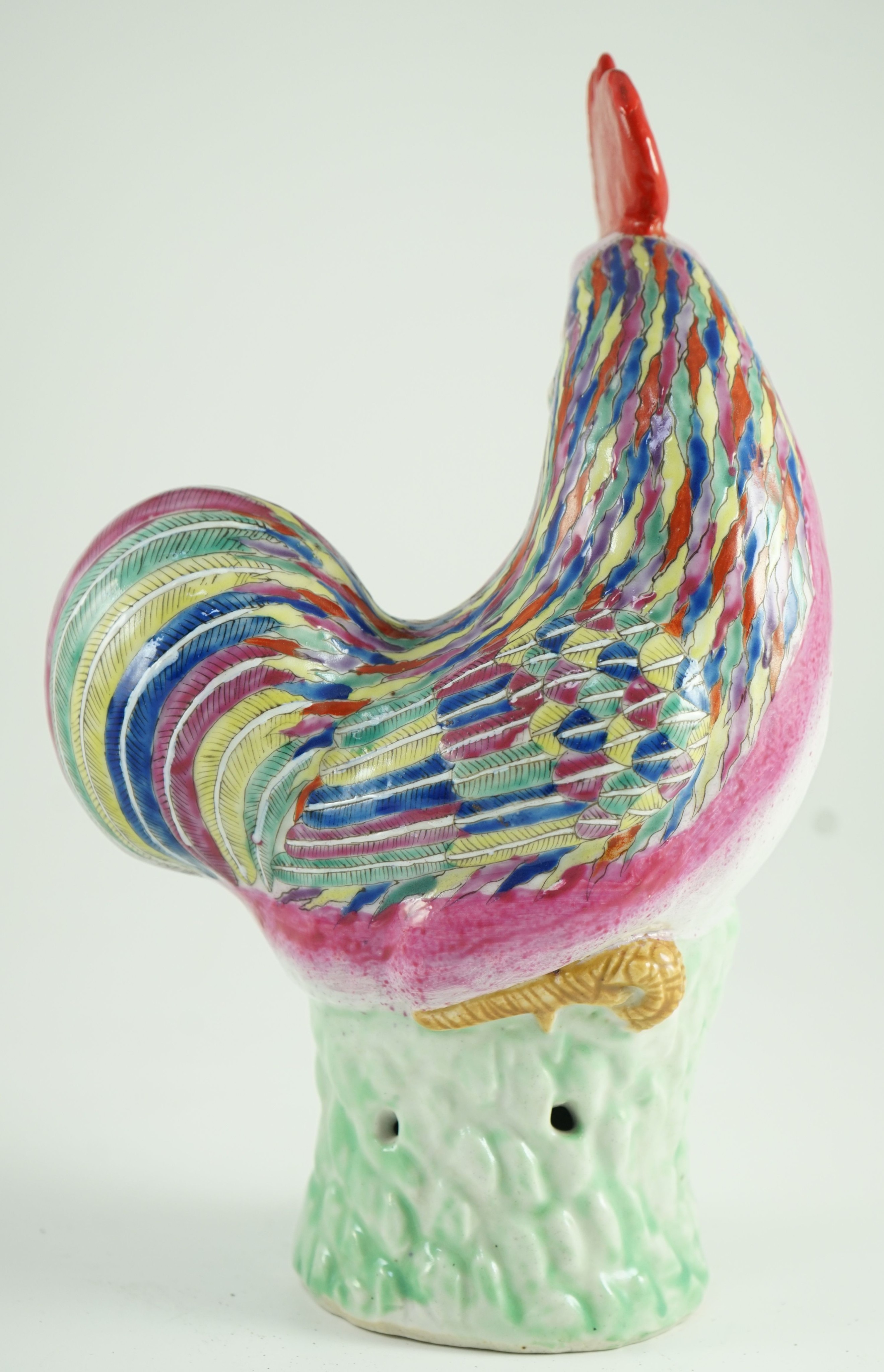 A Chinese enamelled porcelain model of a rooster, Jiaqing period, 29cm high, restoration